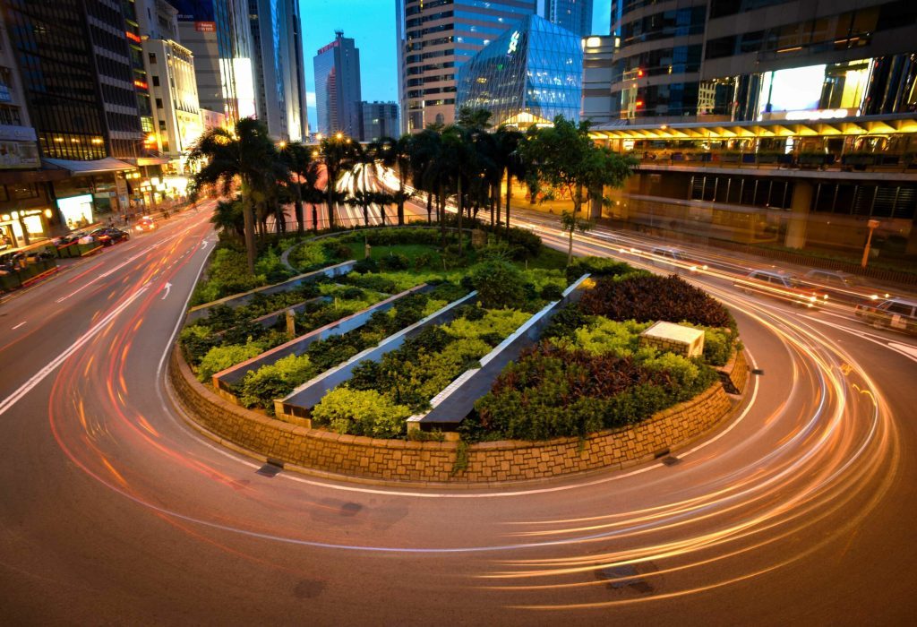stock image of a road with cars driving fast