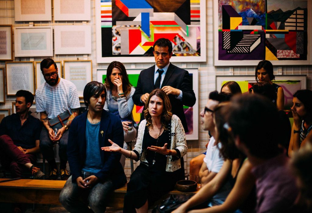 stock image of people at a conference